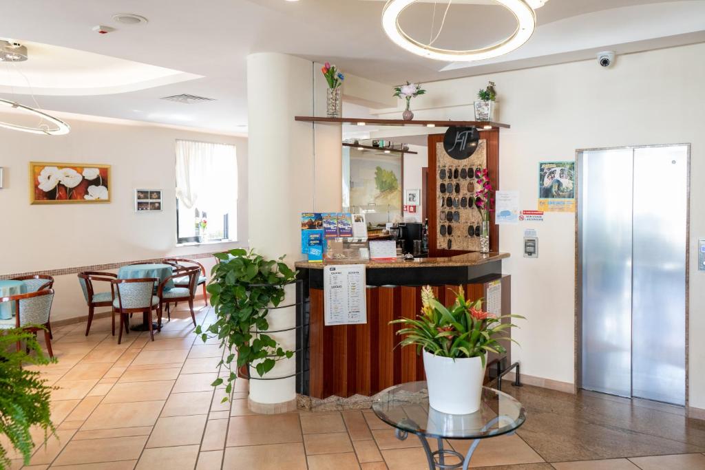 Kuchyň nebo kuchyňský kout v ubytování Hotel Tiglio
