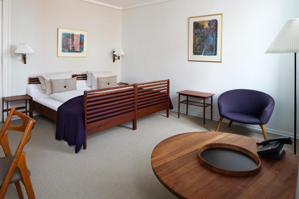 Postel nebo postele na pokoji v ubytování Hotel Alexandra