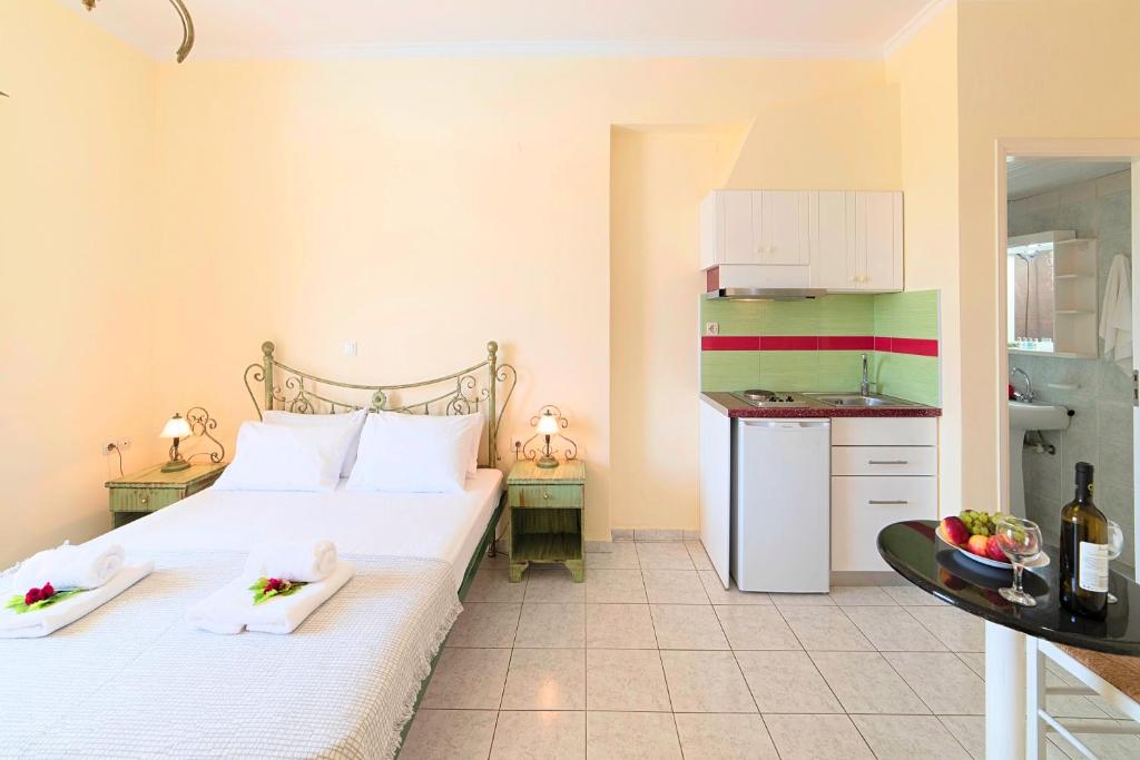 Kuchyň nebo kuchyňský kout v ubytování Palladion Hotel