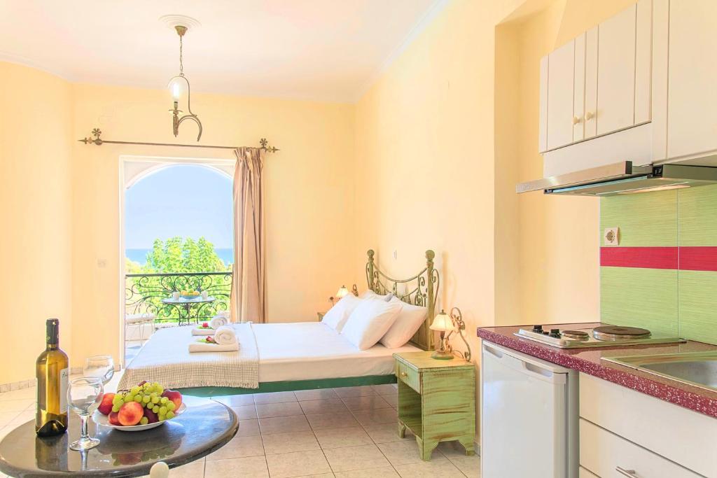 Postel nebo postele na pokoji v ubytování Palladion Hotel