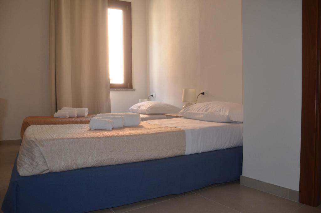 A bed or beds in a room at Belle Époque