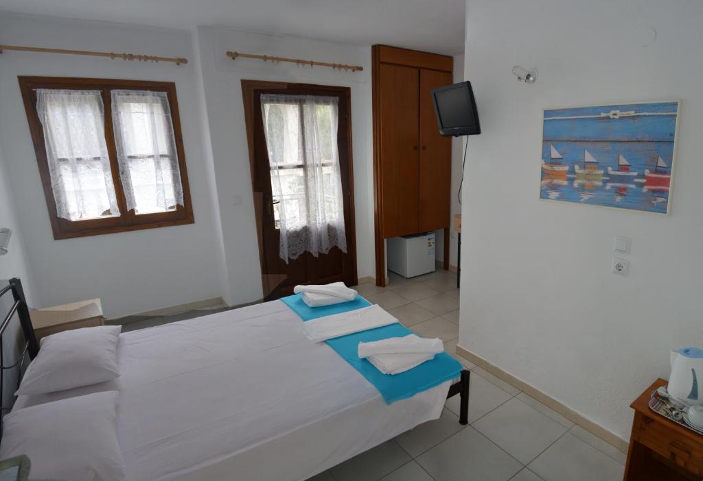 Postel nebo postele na pokoji v ubytování Villa Molos