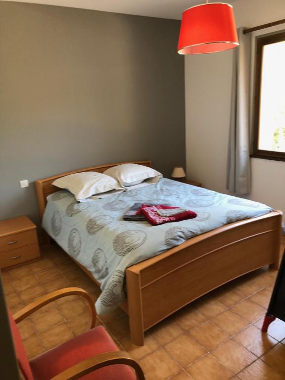 Postel nebo postele na pokoji v ubytování Maison d'en face
