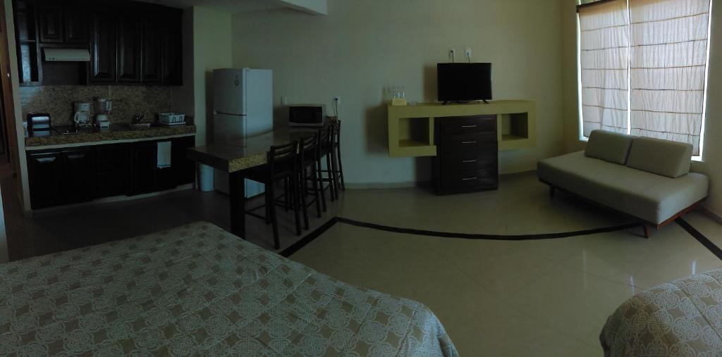 Kuchyň nebo kuchyňský kout v ubytování Hotel Bogavante
