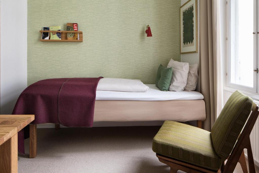 Postel nebo postele na pokoji v ubytování Hotel Alexandra