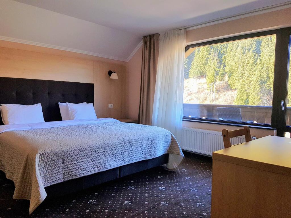 Fotografie z fotogalerie ubytování Carpatica Lodge v destinaci Moieciu de Sus