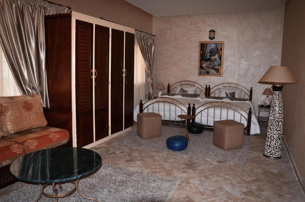 Postel nebo postele na pokoji v ubytování Riad Annada