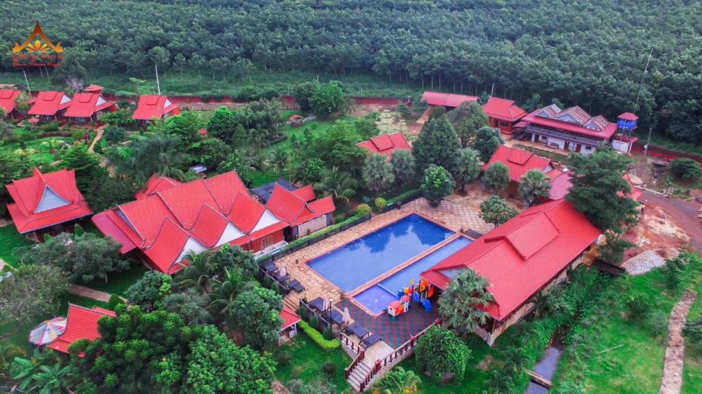 an aerial view of a house with a swimming pool at Phum Khmer Resort in Banlung