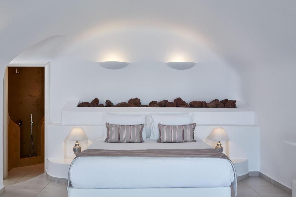 Postel nebo postele na pokoji v ubytování Amber Light Villas