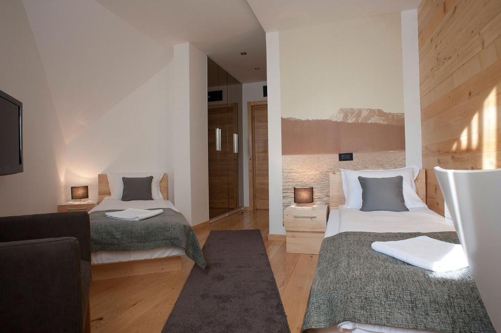 Postel nebo postele na pokoji v ubytování Hotel Žabljak