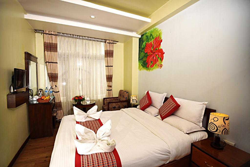 TV a/nebo společenská místnost v ubytování Hotel Osho Home