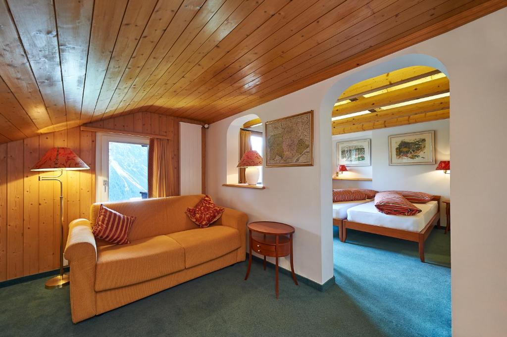 Postel nebo postele na pokoji v ubytování Hotel Arlenwald