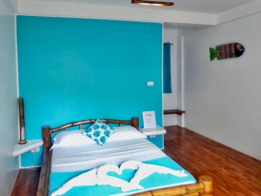 Postel nebo postele na pokoji v ubytování Lunazul Guesthouse