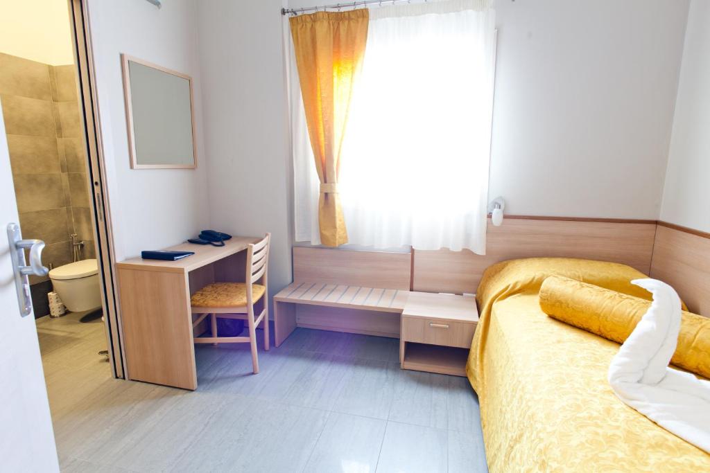 Postel nebo postele na pokoji v ubytování Motel Karibe