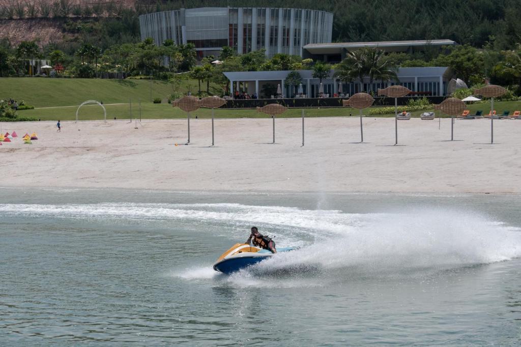 a jet ski in the water near a beach at HARRIS Resort Barelang Batam in Sagulung