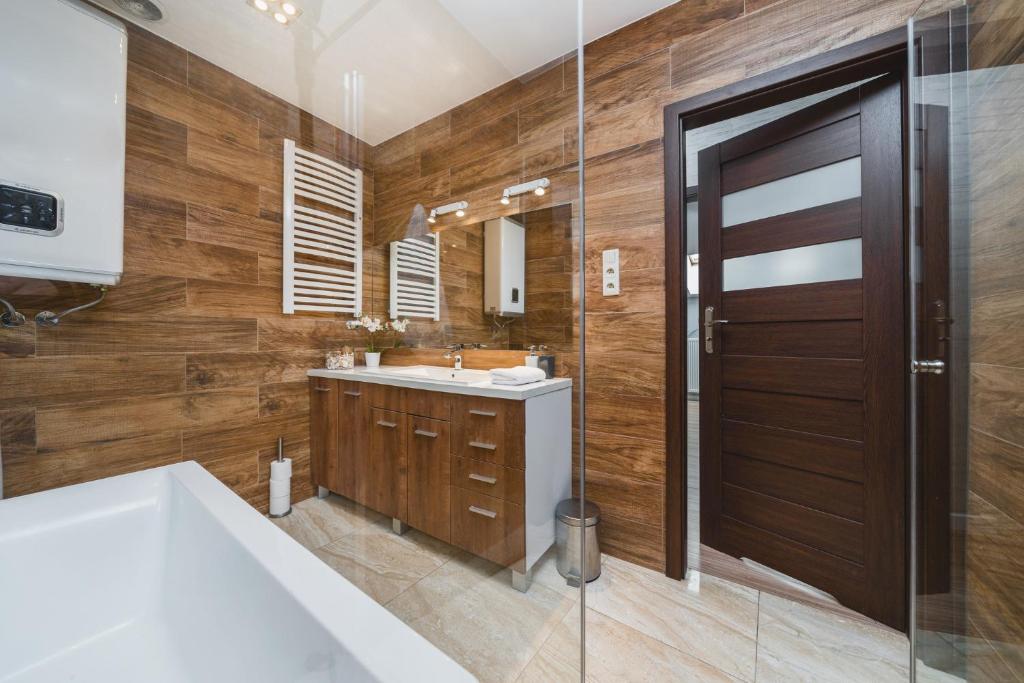 Kúpeľňa v ubytovaní Deluxe Apartments Kraków Brzozowa by Noclegi Renters