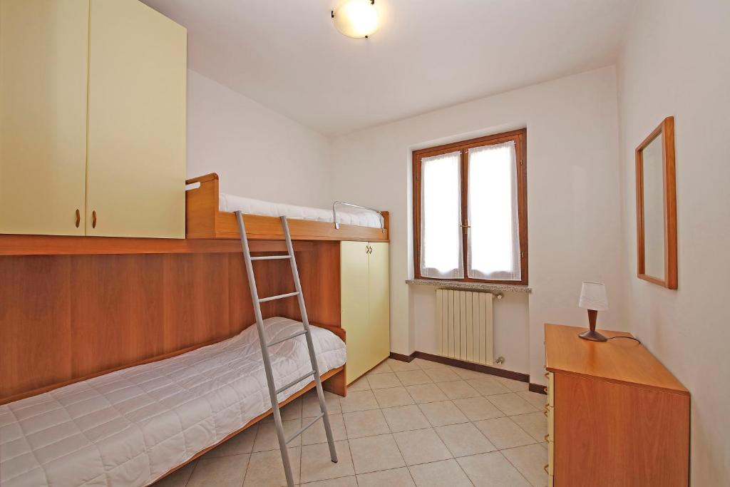Postel nebo postele na pokoji v ubytování Residence Primera Rompala, GTSGroup