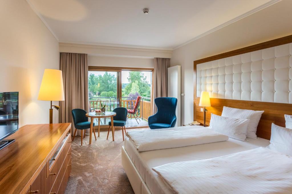 Letto o letti in una camera di Hotel & Spa Der Steirerhof