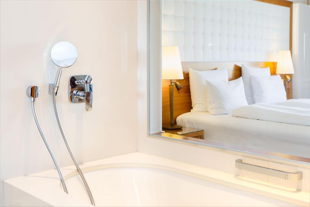 Letto o letti in una camera di Hotel & Spa Der Steirerhof