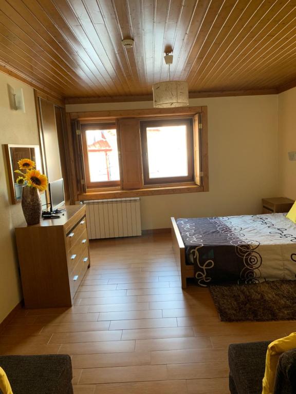 Postel nebo postele na pokoji v ubytování Recantos da Estrela