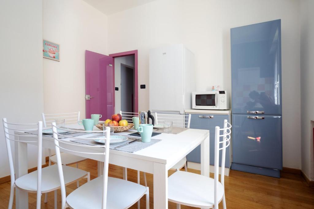 A kitchen or kitchenette at Sant'Orsola Colorful Huge Apartment