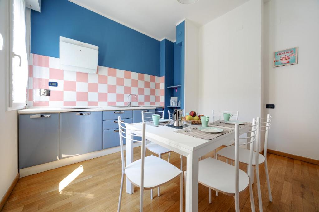 A kitchen or kitchenette at Sant'Orsola Colorful Huge Apartment