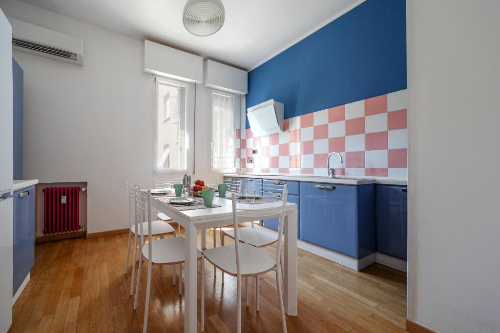 A kitchen or kitchenette at Sant'Orsola Colorful Huge Apartment