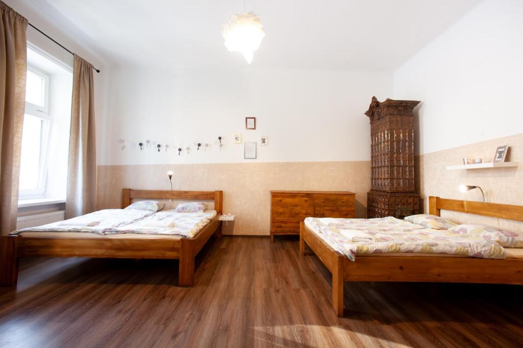 Postel nebo postele na pokoji v ubytování Wow Wow Apartment