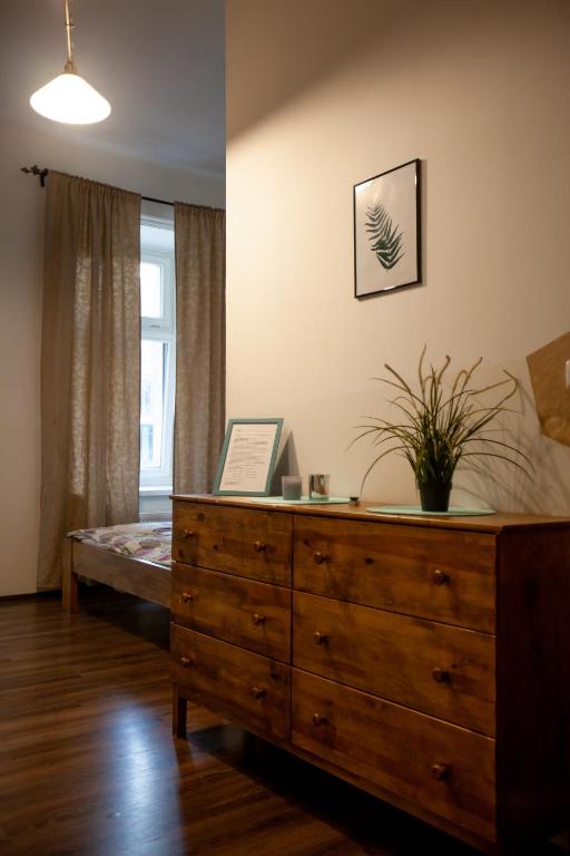 Postel nebo postele na pokoji v ubytování Wow Wow Apartment