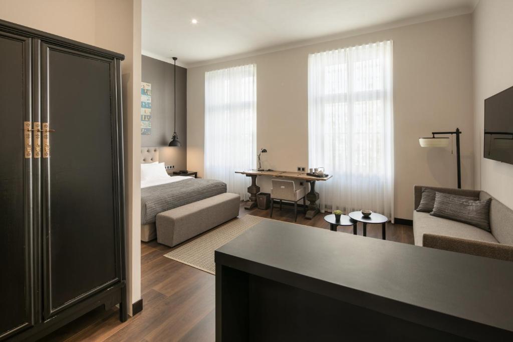 Postel nebo postele na pokoji v ubytování Quentin Prague Hotel