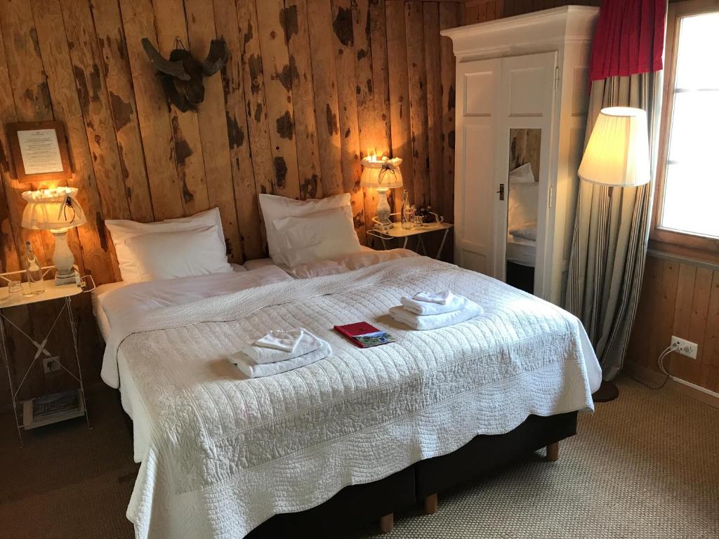 Postel nebo postele na pokoji v ubytování Hamilton Lodge & Spa