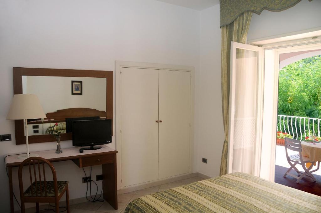 TV a/nebo společenská místnost v ubytování Hotel Biancamaria