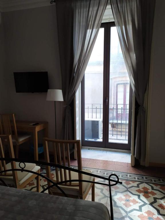 Televízia a/alebo spoločenská miestnosť v ubytovaní B&B A Casa Di GioSi