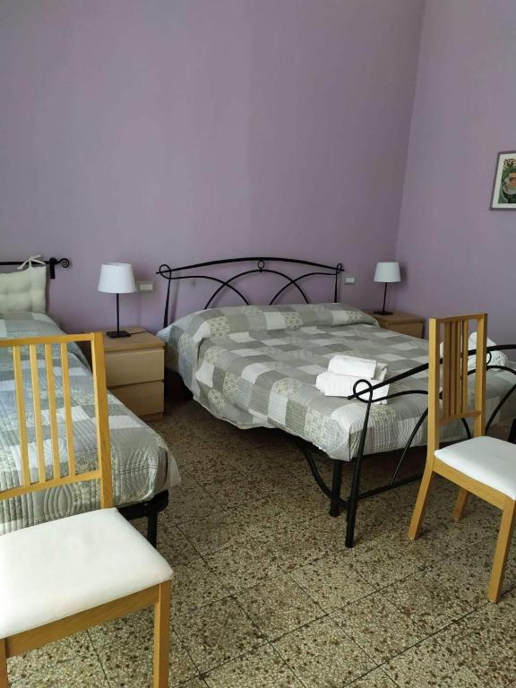 Posteľ alebo postele v izbe v ubytovaní B&B A Casa Di GioSi