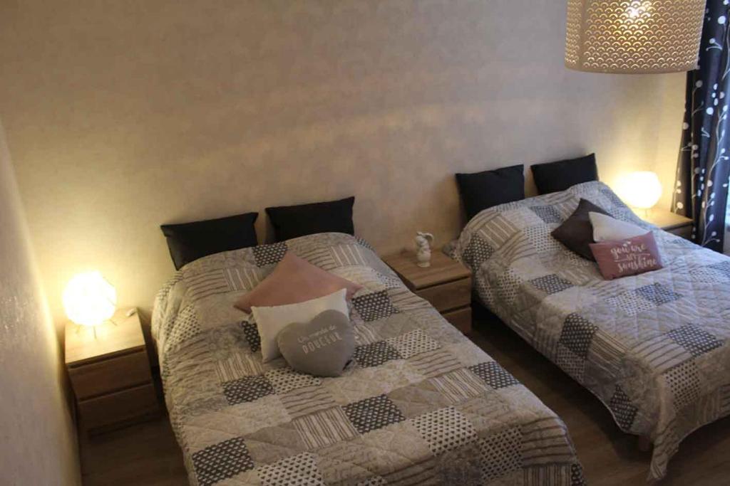 Postel nebo postele na pokoji v ubytování Le Bacchus
