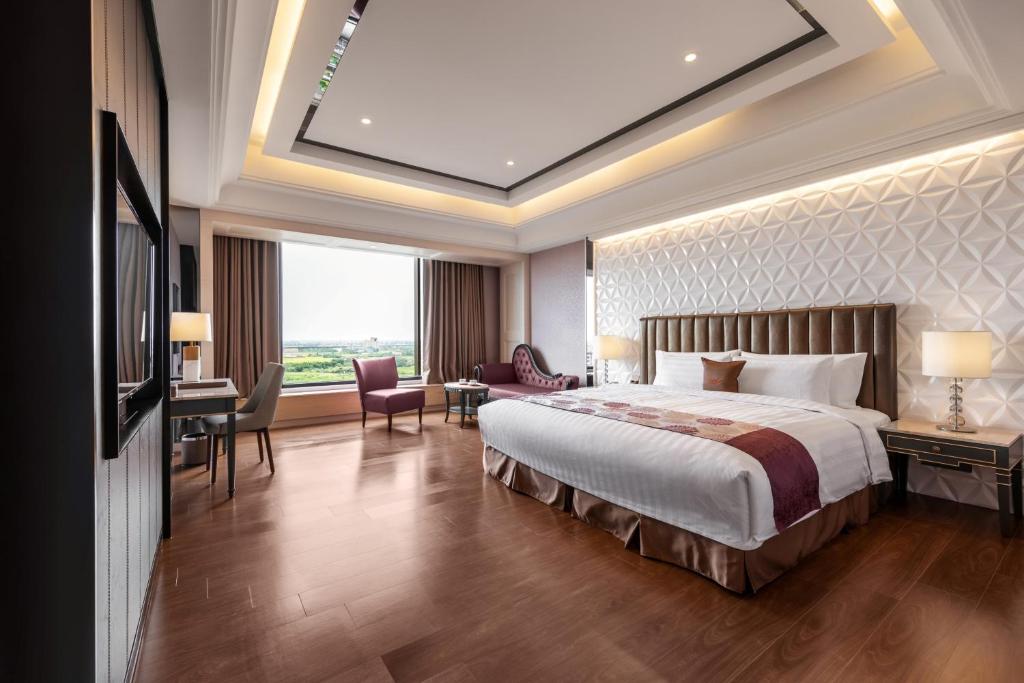 Postel nebo postele na pokoji v ubytování Chuang-tang Spring Spa Hotel