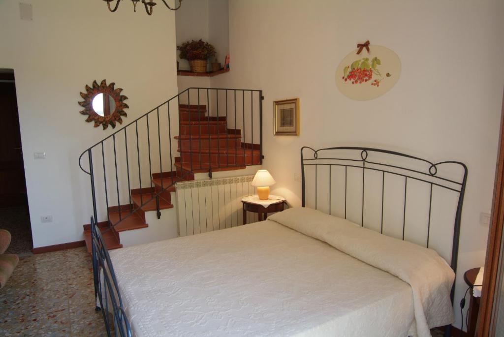 Postel nebo postele na pokoji v ubytování Country Hotel Vessus