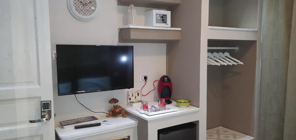 Telewizja i/lub zestaw kina domowego w obiekcie Guesthouse Luisella
