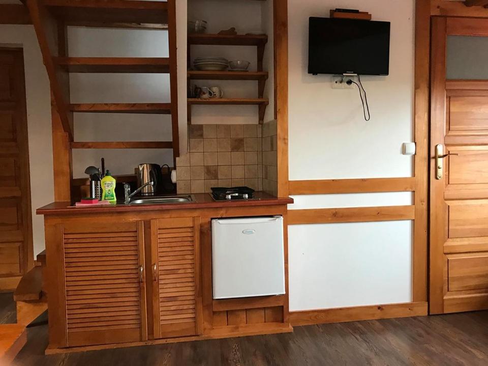 Kuchyňa alebo kuchynka v ubytovaní Domek pod Skocznią