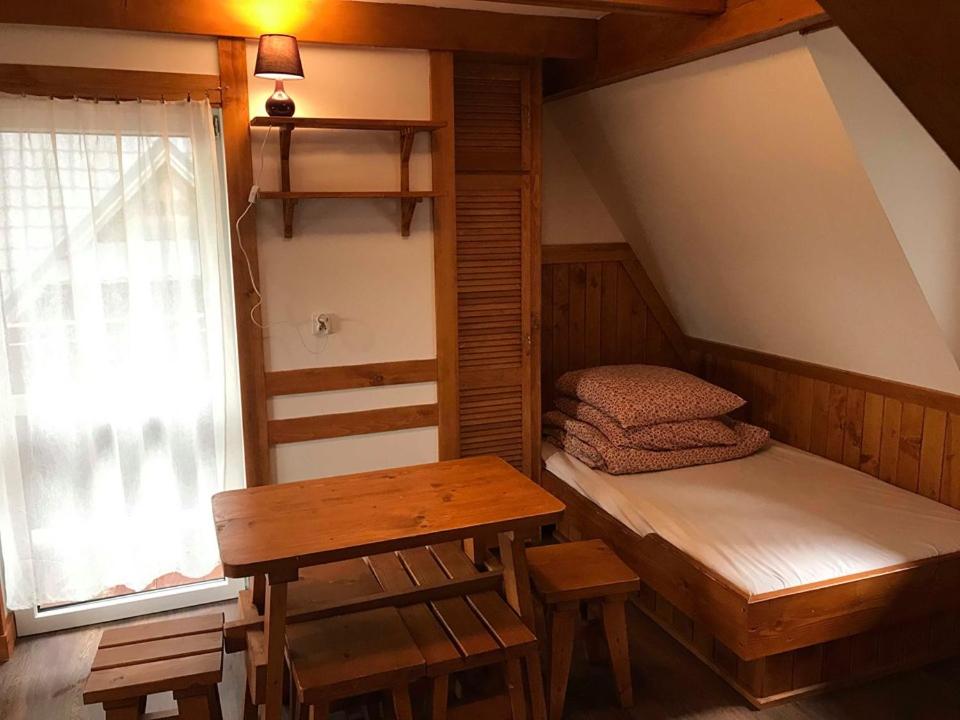 Ліжко або ліжка в номері Domek pod Skocznią