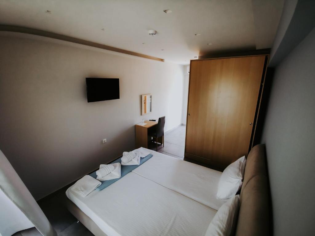 Rúm í herbergi á 3 Island View Hotel