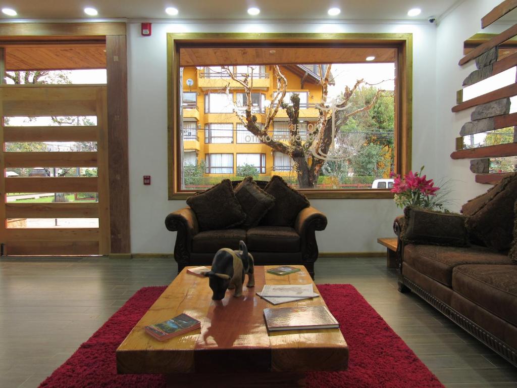Zona de estar de Hotel Pucón Indómito