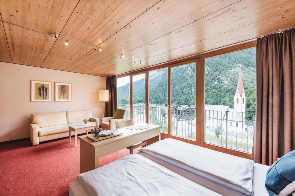 Postel nebo postele na pokoji v ubytování Hotel Adler
