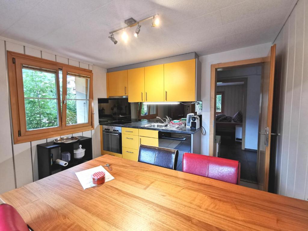 Kuchyň nebo kuchyňský kout v ubytování Apartments Chalet Tatyana