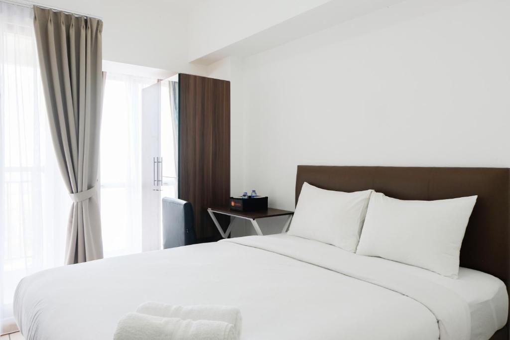 Comfortable Studio Apartment M-Town Residence By Travelio