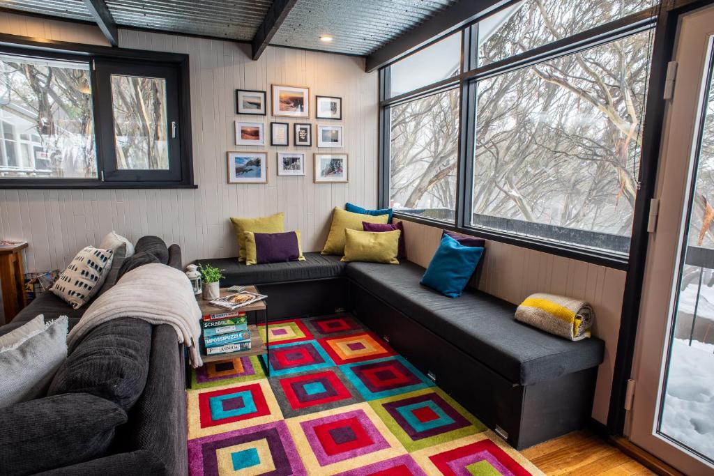 Area soggiorno di Amber Lodge Mt Buller