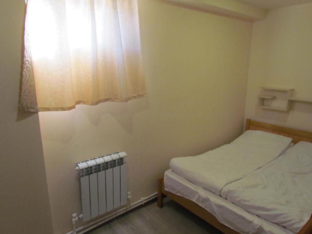 Postel nebo postele na pokoji v ubytování Arsego Hostel