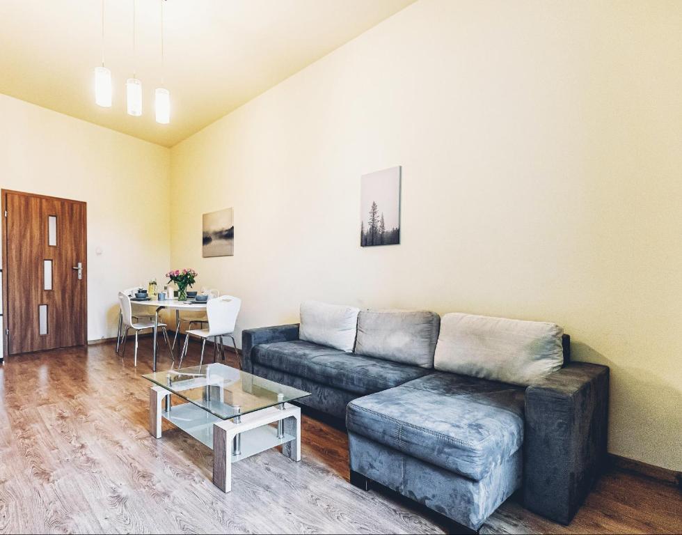 Posedenie v ubytovaní Apartament Żółty Narutowicza 11