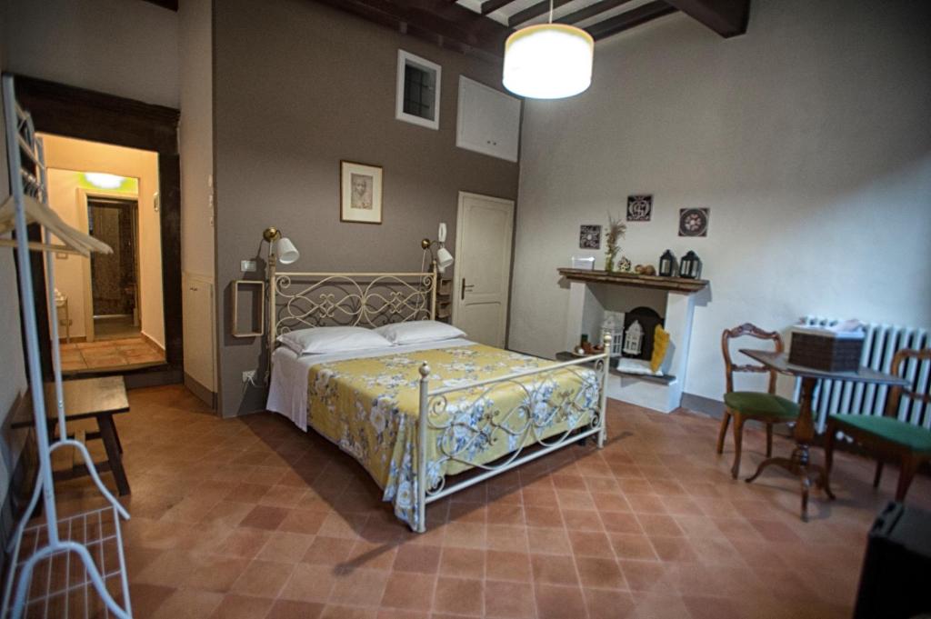 Giường trong phòng chung tại La Giuggiola Sweet Home