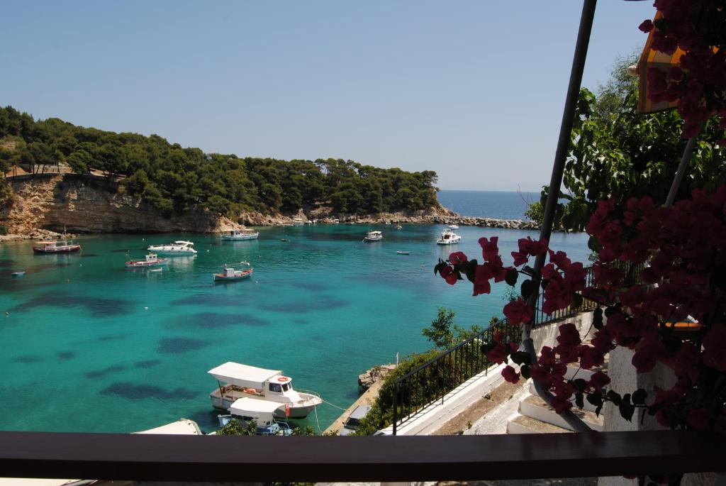 a view of a harbor with boats in the water at Pension Dimitris in Votsi